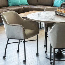 Comfortabele armstoel velours grijs met wieltjes