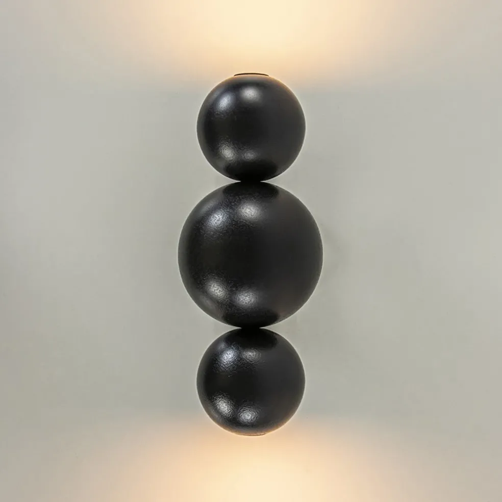 Design wandlamp textured black inclusief LED