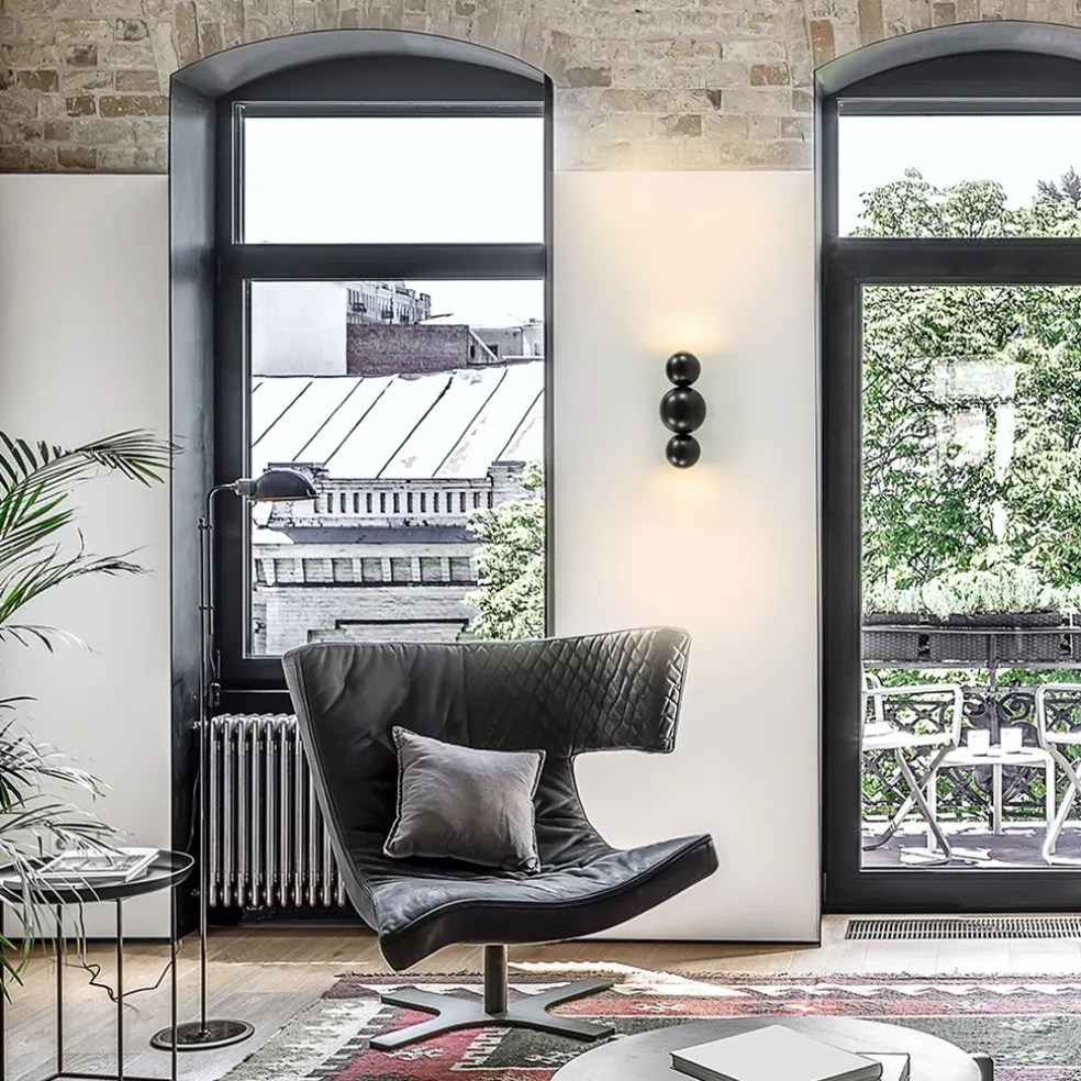 Design wandlamp textured black inclusief LED