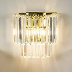 Klassieke wandlamp goud met helder glazen pegels