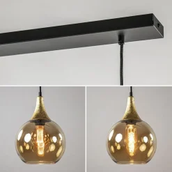 4-Lichts eettafelhanglamp zwart/goud met amber glazen bollen