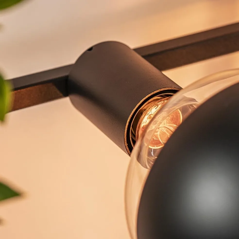 Rechthoekige wandlamp zwart frame met plantenpotten