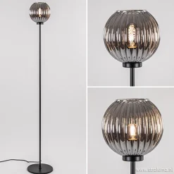 Zwarte vloerlamp met smoke glazen kap